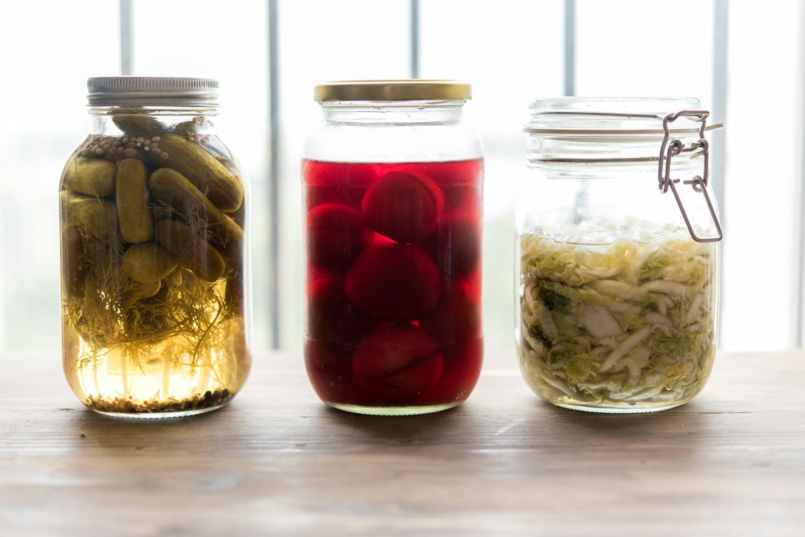 Placeholder — bowl of fermented vegetables on a wooden table, representing gut-supportive whole foods