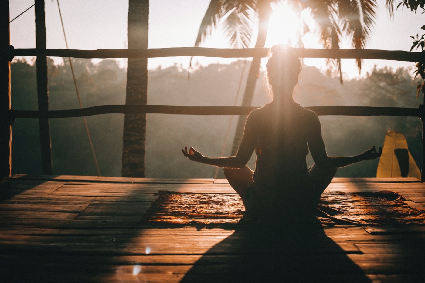 Calm meditation by a sunlit window — peaceful imagery for mental and brain health support