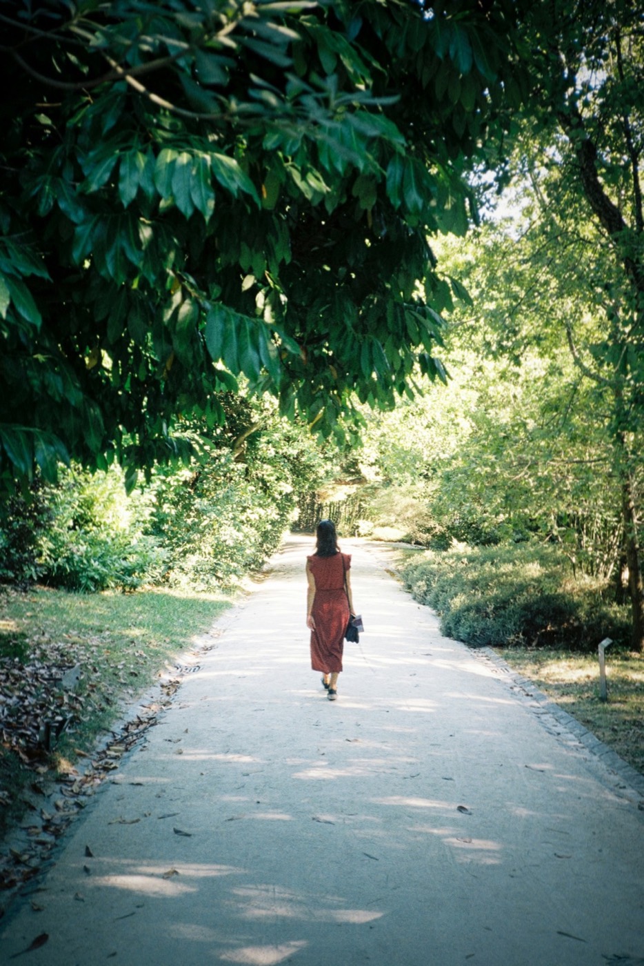 Woman walking outdoors in athletic wear — supportive, hopeful imagery for metabolic health