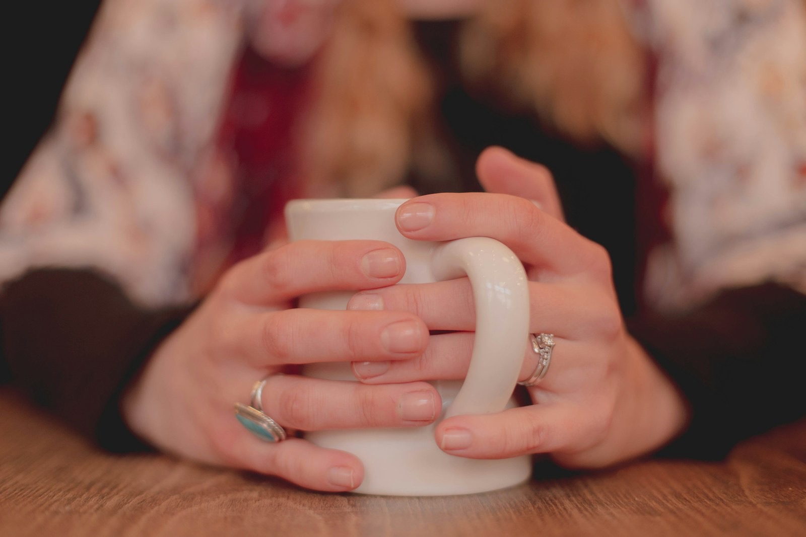 Hands cradling a warm mug of tea — immune support and comfort